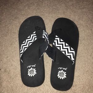 Yellow box flip flops